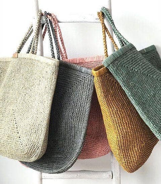 Filee Tote Bag by Zanatany Concepts.
Filee is a raffia bag handmade in Madagascar is the perfect daily accessory for a beach-goer. Its natural material and unique craftsmanship make it not only stylish, but also eco-friendly.