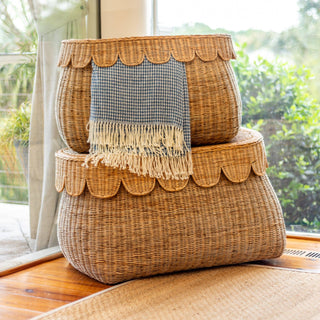 Scalloped rattan basket perfect for storage by Auden & Avery.