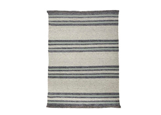 Indoor or outdoor striped rug by Pom Pom at Home. 