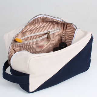 Inside View of ShoreBags Natural White and Navy Tavel Kit with navy canvas handle.