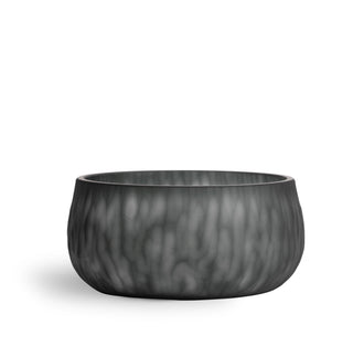 Formed from glass by hand this round glass bowl pairs with any decor