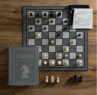 Fabric-wrapped book with integrated storage that comes with a
full-sized folding game board for chess
32 Wooden Chess pieces
2 Fabric pouches
Instructions