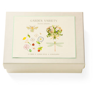  Garden Variety Note Card Box by Karen Adams Designs.
This set of eight natural white note cards includes four different designs—each elegantly hand-embellished. Top-folded cards, blank on the inside. 