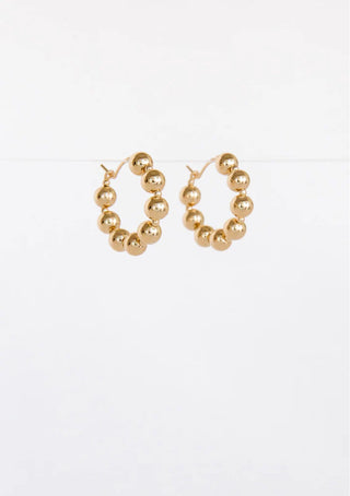 Hoops featuring eight small 14k gold filled beads by Abacus Row.