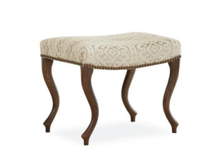 Fabric ottoman with nailheads and fruitwood legs