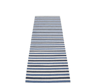 Plastic rug by Pappelina for indoor and outdoor use, made in Sweden. Made of Swedish manufactured, certified y free PVC ribbon, woven on traditional looms using wooden shuttles. Very practical and easy-to-care-for, hand or machine wash at low temperature 30°C/85F, no spin.