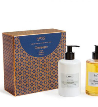 Liquid soap and hand cream in a citrus fragrance by Lafco featured in a gift box set.