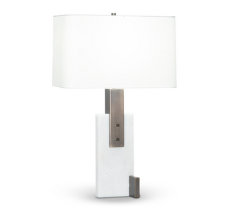 White marble table lamp with asymmetric bronze accents and a rectangular shade.