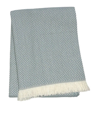 A Soft Idea Sky Blue unbrushed herringbone throw with off white delicate fringe