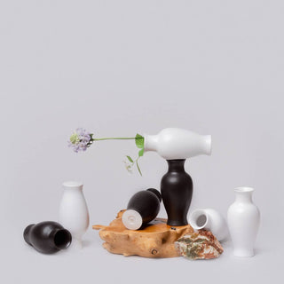 colorful glazed porcelain H x D: 5 in x 3 1/8 in by Middle Kingdom.Our neutral mini vases dress up, dress down, hold flowers, create sculptural statements, set beautiful tables, make great gifts, and fit in everywhere. 