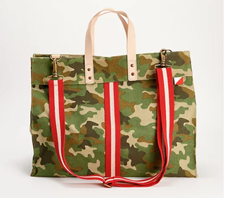 Venture Camo  tote bag with red and white adjustable strap and stripe down the middle. With natural tan handles.