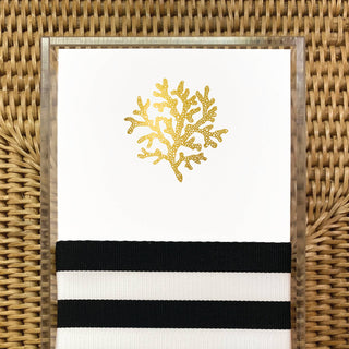 white pad with gold coral