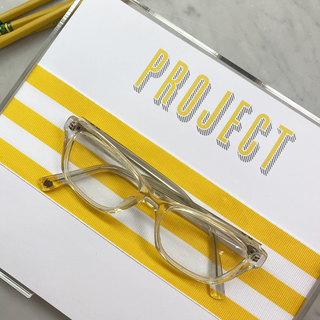 8.5"x7" pad with "Project" written in yellow.