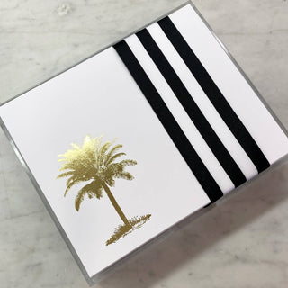 Notepad 8.5”x7” with a gold foil palm tree printed on the left hand side of the pad.