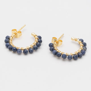 Gold hoop earrings with blue lapiz beads