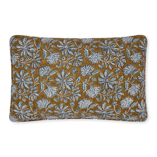 Self welted linen pillow in tobacco with off white and blue floral patter.